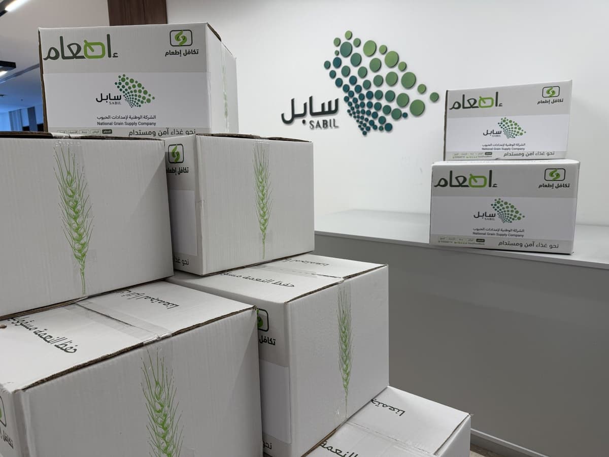 Golden wheat field against blue sky